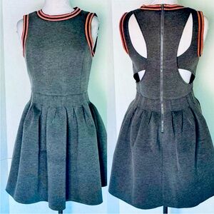 Scuba material!  Super stretchy, flirty and unique comfy dress.  I loved it!